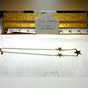 Sara Cov three star gold tone necklace